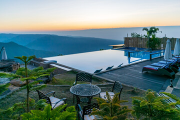 A view of sunrise against an infinity pool, Cherrapunji, Meghalaya, India