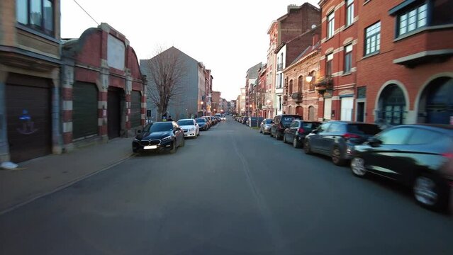 Real time dashcam footage of a car driving on the road in the afternoon in Brussels, Belgium