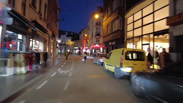 Timelapse dashcam footage of a car driving on the road at night in Brussels, Belgium