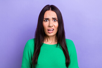 Photo of shocked impressed lady dressed green sweater listening bad news isolated violet color background - obrazy, fototapety, plakaty
