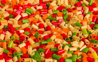 different colored raw snacks tubular shaped in size