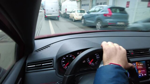 FPV shot of a person driving a Seat car on the road in Brussels, Belgium