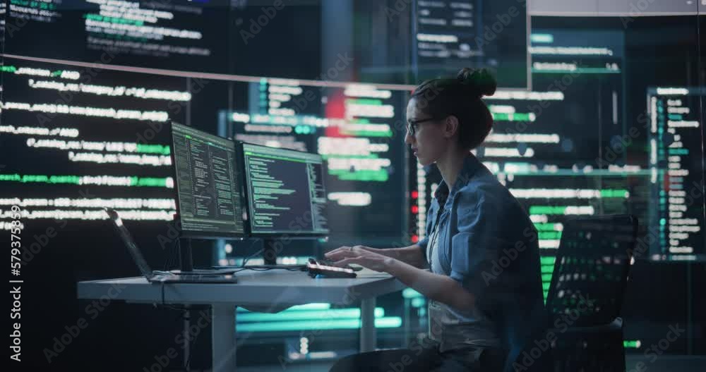 Fototapete Female Programmer Working in Monitoring Control Room, Surrounded by Big Screens Displaying Lines of Programming Language Code. Portrait of Woman Creating a Software. Abstract Futuristic Coding Concept