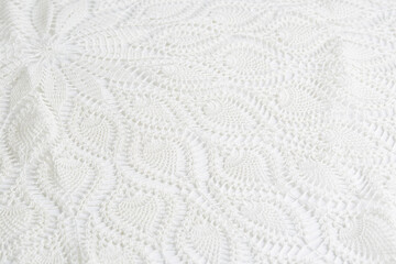 Lace tablecloth with repeating circular pattern. Crochet textile design. 