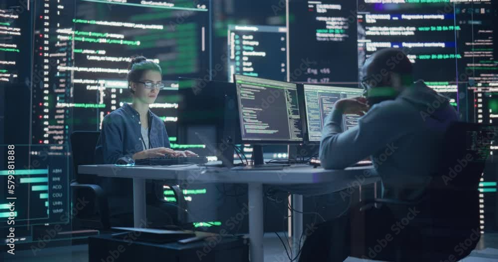 Fototapete Portrait of Two Programmers Working in a Monitoring Control Room, Surrounded by Big Screens Displaying Lines of Programming Language Code. Portrait of Diverse Developers Creating a Software and Coding