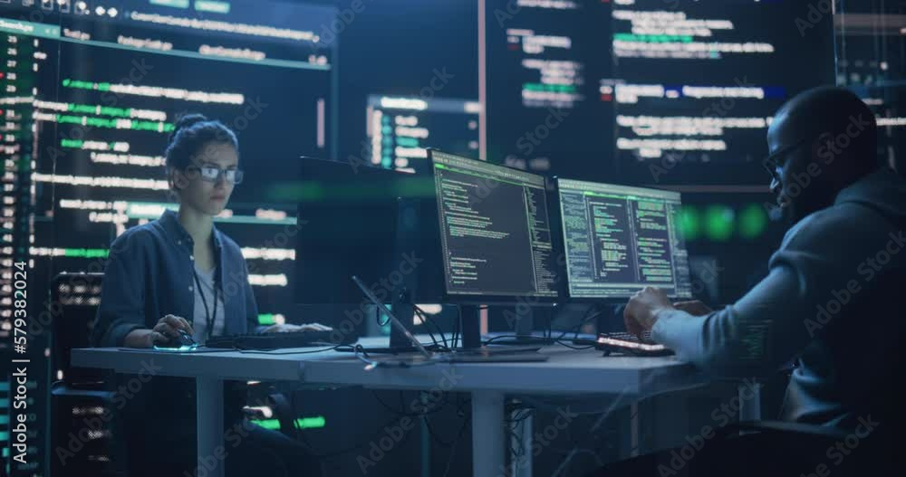 Aufkleber Portrait Two Diverse Developpers Working on Computers, Typing Lines of Code that Appear on Big Screens Surrounding Them. Male and Female Programmers Creating Innovative Software Together, Fixing Bugs