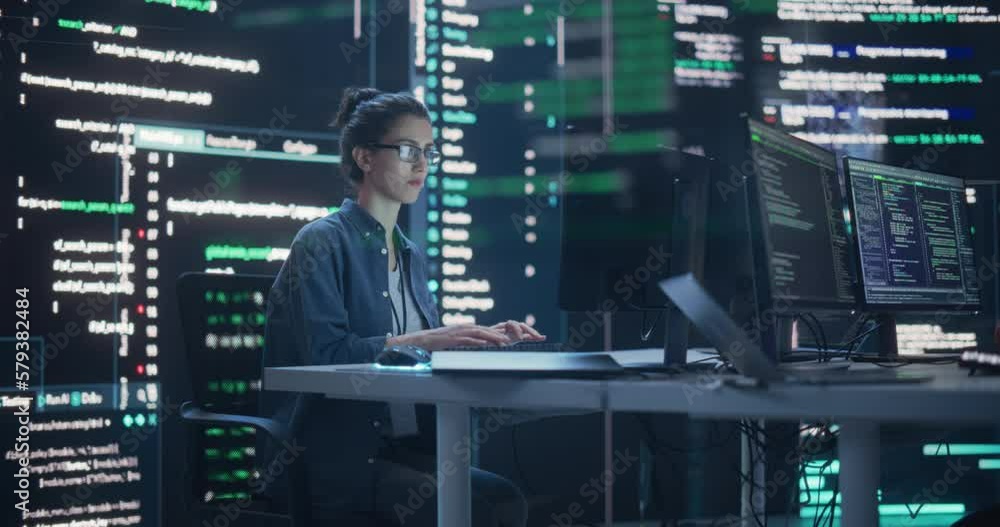 Aufkleber Young Man and Woman Working on Desktop Computers, Surrounded by Big Screens Displaying Code Lines. Professional Computer Engineers Developping System Control and Monitoring Telecommunications