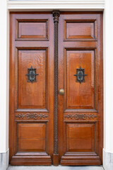 Luxuriously decorated old wooden door