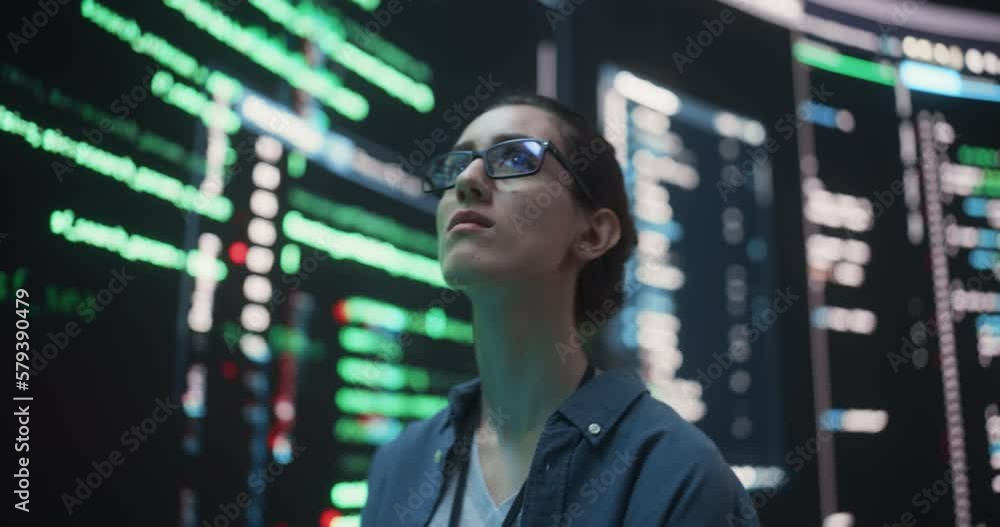 Aufkleber Zoom In Portrait of Young Woman with Glasses Looking at Big Digital Screens Glitching While Displaying Code Lines. Professional Hacker Breaking Through Cybersecurity Protection System, Changing Code