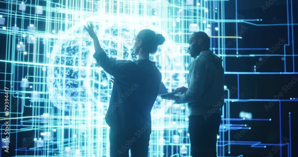 Fototapete Portrait of Two Diverse Colleagues Looking at a Big Screen with Neural Network Visualisation Animation. Professional Programmers Using Laptop Computer and Discussing Big Data Server Improvement