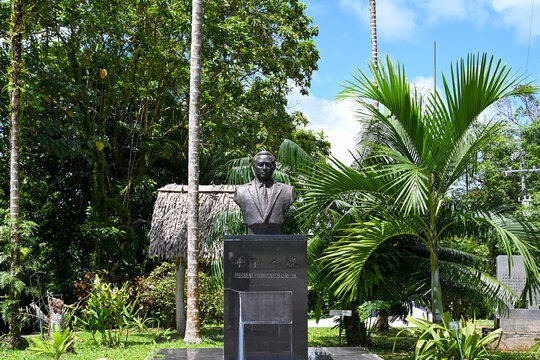 Koror, Palau - FEB 25, 2023: The statue at the door is the first president of Palau in Belau National Museum.