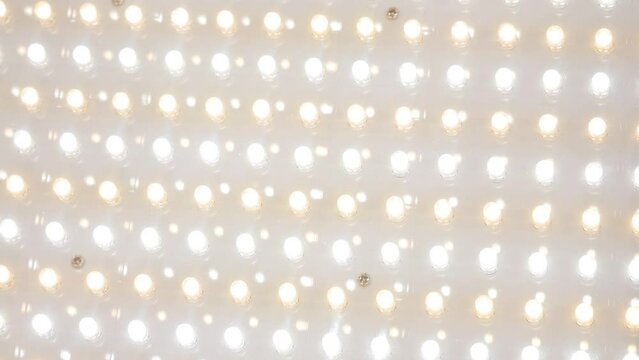 Flashing Led wall light. 
searchlight from light-emitting diodes change light from white to yellow.
Spotlight bulbs light up.
Flashing LED light.

