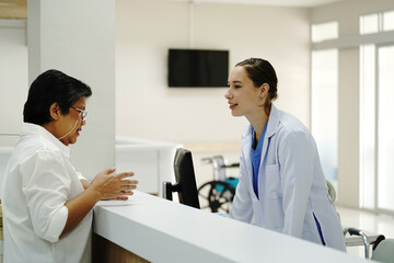 Fototapeta premium Healthcare and Medicine! The hospital, nurses station and patient prep areas. Nurses hurry about, getting the patients ready for surgical procedures, to keep the doctors on their surgery schedule. 