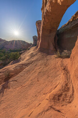 hiking the broken arch trail to tapestry arch in arches national park, utah, usa