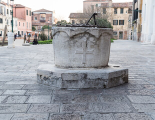 ancient water well in Venice, Italy