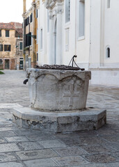 ancient water well in Venice, Italy