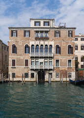 Obraz na płótnie Canvas Beautiful charming facade of an old building in Venice, Italy