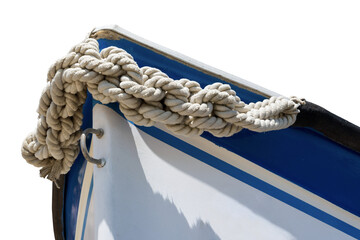 Close-up of a small white and blue recreational boat with hawser isolated on white or transparent...
