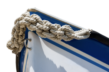 Close-up of a small white and blue recreational boat with hawser isolated on white or transparent background. Liguria, Italy, southern Europe. Png.