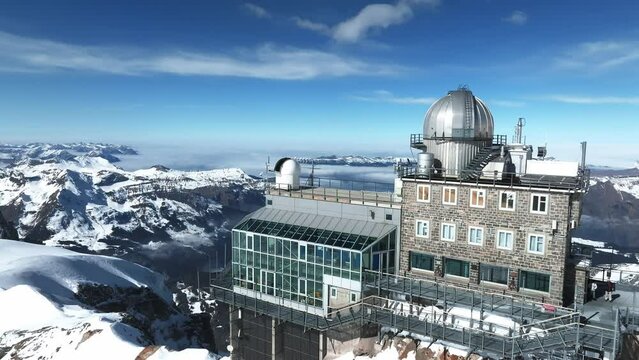 Aerial panorama view of the Sphinx Observatory on Jungfraujoch - Top of Europe, one of the highest observatories in the world located at the Jungfrau railway station, Bernese Oberland, Switzerland.