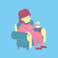 person sitting in armchair, person lying down, person eating popcorn