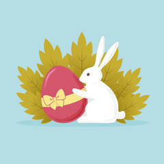 White cute bunny holding easter egg with the ribbon and bow. With big plants on the background.