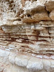 Geological structures. Natural background for your stylish designs from light stone texture of the rock in beige color.