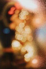 Fototapeta premium Closeup shot of the bokeh lights of a bright Christmas tree