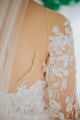 Beautiful closeup of a bridal white dress