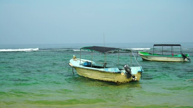 Two Motor Boats On The Waves In The Sea