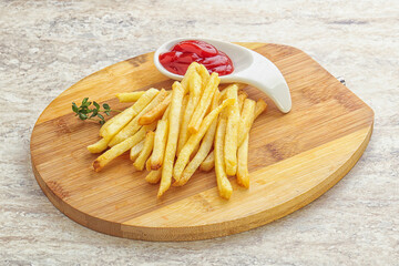 French fried potato over board
