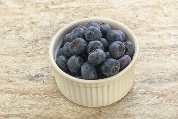 Sweet ripe blueberry heap in the bowl