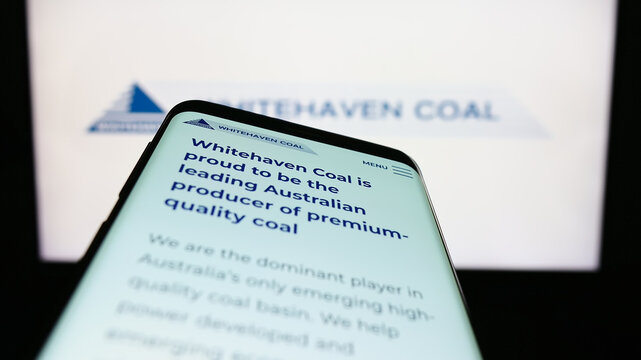 Stuttgart, Germany - 03-07-2023: Mobile phone with webpage of mining company Whitehaven Coal Limited on screen in front of business logo. Focus on center of phone display.