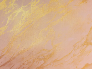 Abstract background with cappuccino brown tones with gold marble veins pattern.