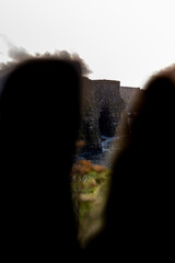 Stone Cliffs in Ireland on a cloudy day with a beautiful sunset by the ocean in spring