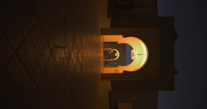 Riad corridor with man walking, vertical 4K