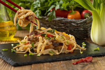 Pasta with chicken in oyster sauce.