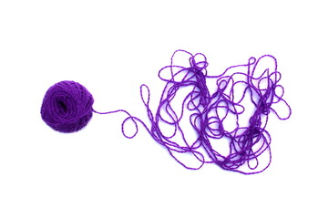  Entangled threads with a ball lie on a white background.