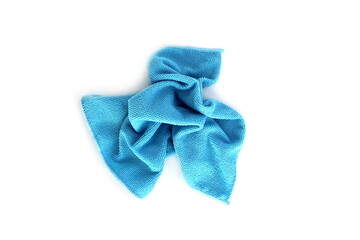 A blue cleaning rag lies on a white isolated background.	