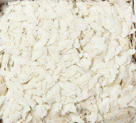 Flattened rice, Indian poha, is rice which is flattened into flat, light, dry flakes, Poha Isolated