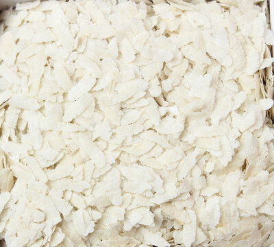 Flattened rice, Indian poha, is rice which is flattened into flat, light, dry flakes, Poha Isolated