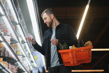Man shopping in a supermarket
