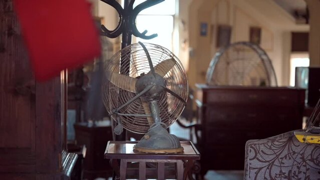 Slow motion of an old fan and vintage furniture in an old house in Egypt