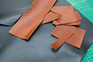 Pieces of natural leather, handmade leather products.