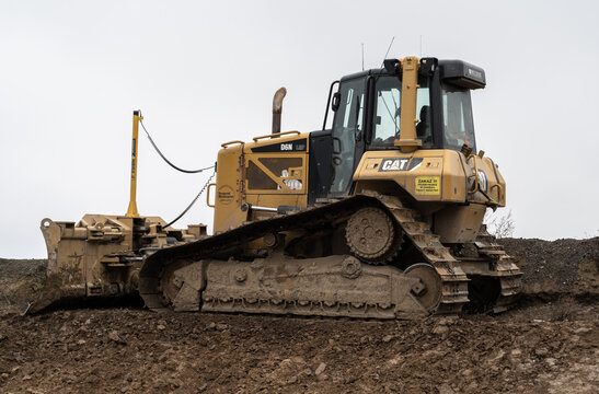 Caterpillar D6N LGP crawler dozer with a metal blade for pushing material. CAT bulldozer at construction site on November 6, 2022 in Luczyce, Poland.