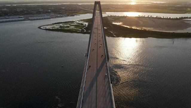 Aerial view of the Arthur Ravenel Jr. Bridge during sunrise. 