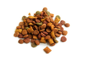 Small pile of cat food on a white background.