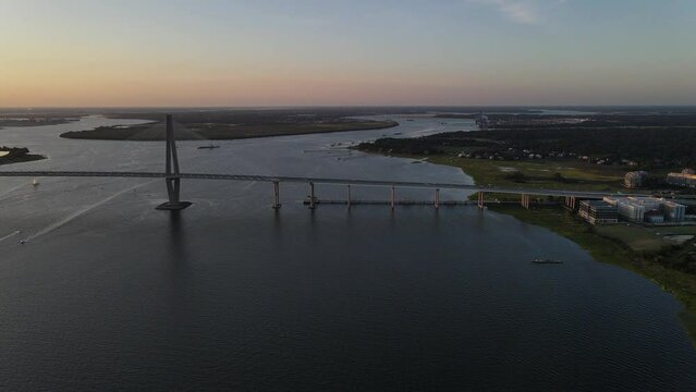 Aerial view of the Arthur Ravenel Jr. Bridge during sunrise. 