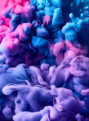 Flowing blue and pink mix paint abstract texture background