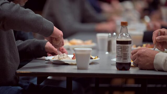 People eating in a public diner